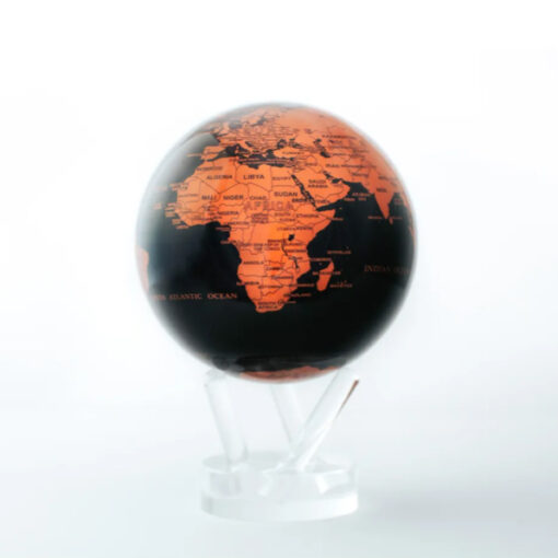 A small globe with orange and black continents on top of it.
