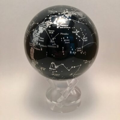 A black and white globe on a stand