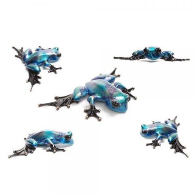 A group of blue frogs laying on top of each other.