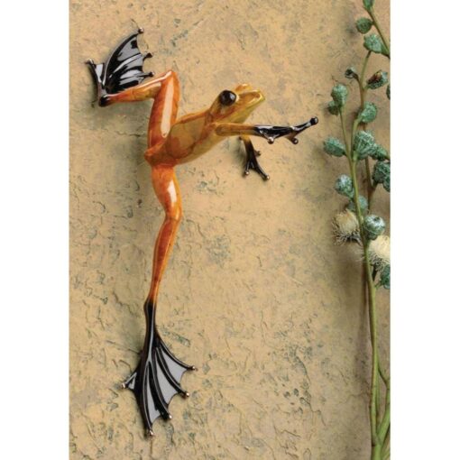 A painting of a frog with long legs and a butterfly on its back.