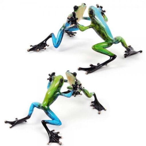 Two frogs are shown in different poses.
