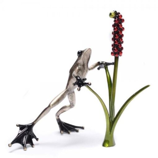 A lizard is climbing on the flower stalk.