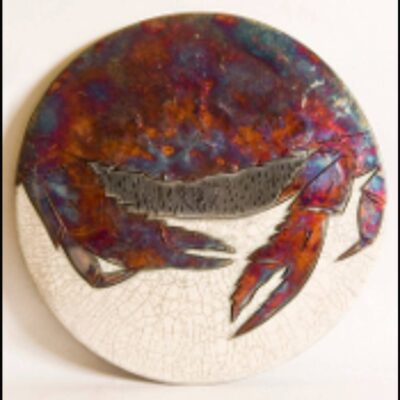 A crab is shown on the side of a plate.