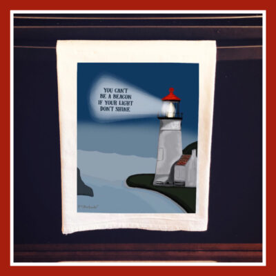A towel with a picture of a lighthouse.
