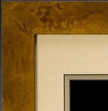 A picture frame with a black background and brown wood trim.