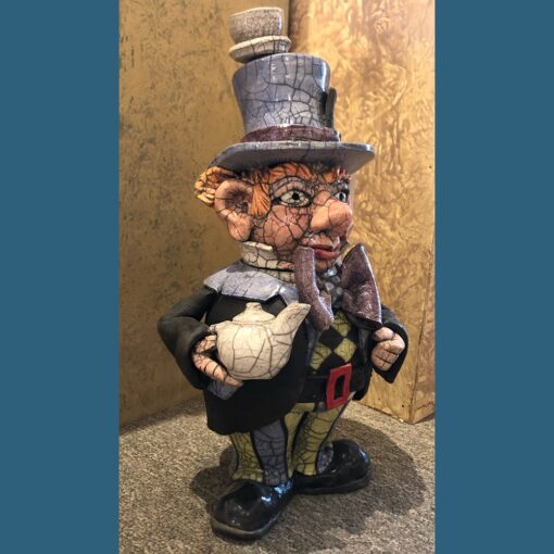 A toy of a man in top hat and coat