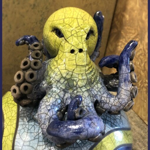 A close up of an octopus statue