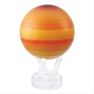 A yellow and orange ball on top of a clear stand.