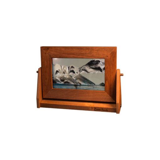 A picture frame with a wooden stand on top of it.